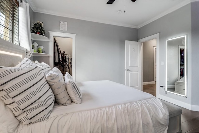 20502 Greeley Cv, Lago Vista, TX 78645 - bedroom featuring crown molding, wood finished floors, and a ceiling fan