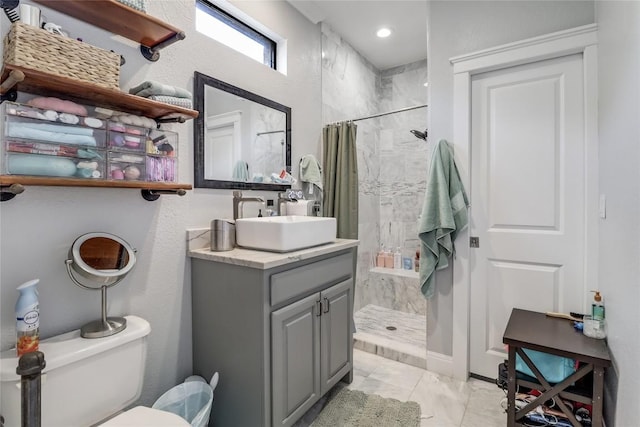 20502 Greeley Cv, Lago Vista, TX 78645 - bathroom with a tile shower, vanity, and marble look tiles