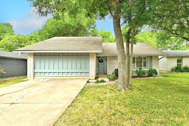 5202 Hedgewood Dr, Austin, TX 78745 - view of front of property with roof with shingles, a garage, concrete driveway, and a front yard