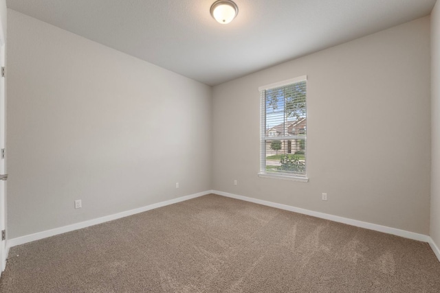 4356 Mayfield Ranch Blvd, Round Rock, TX 78681 - carpeted empty room with baseboards