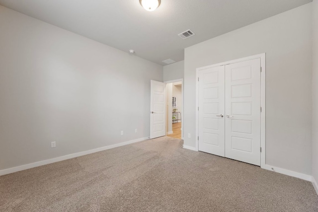 4356 Mayfield Ranch Blvd, Round Rock, TX 78681 - unfurnished bedroom with carpet flooring, baseboards, and a closet
