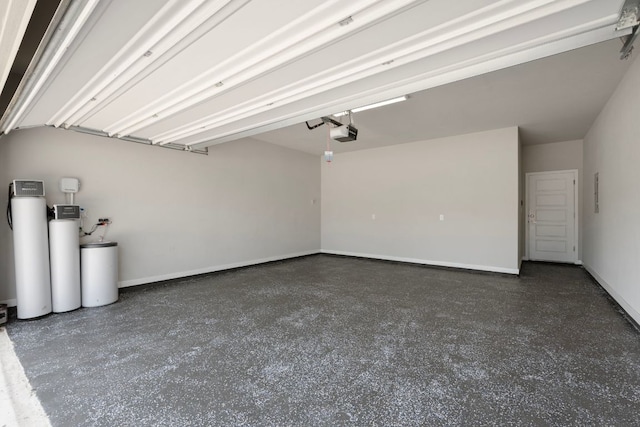 4356 Mayfield Ranch Blvd, Round Rock, TX 78681 - garage with a garage door opener and baseboards