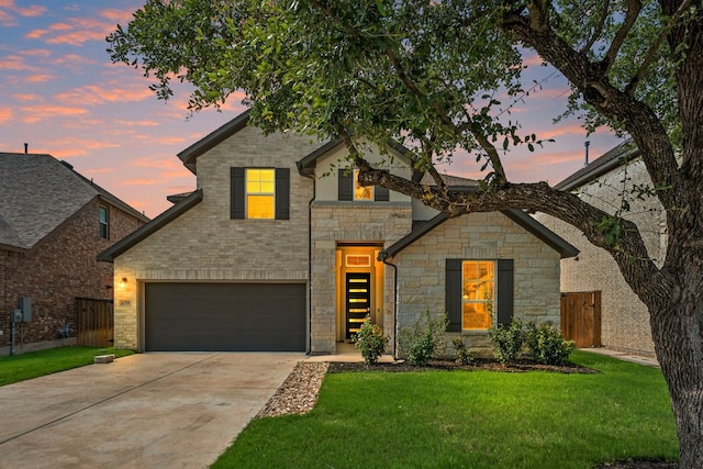 4356 Mayfield Ranch Blvd, Round Rock, TX 78681 - view of front of property featuring stone siding, driveway, and an attached garage