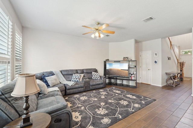 4013 Veiled Falls Dr, Pflugerville, TX 78660 - living room featuring ceiling fan, wood finished floors, and baseboards