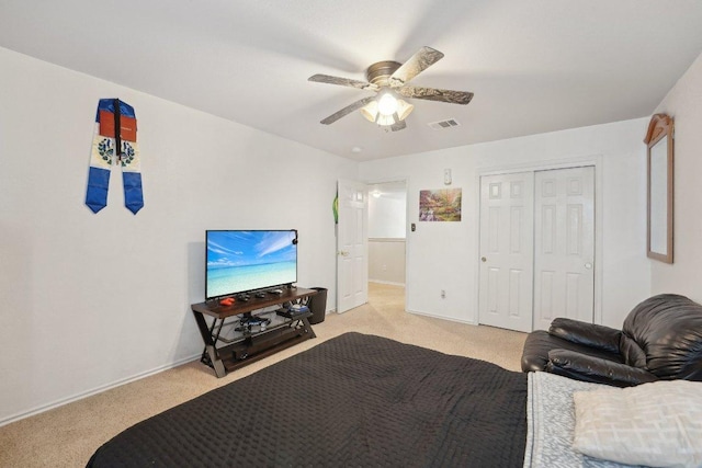 4013 Veiled Falls Dr, Pflugerville, TX 78660 - bedroom with light carpet, baseboards, ceiling fan, and a closet