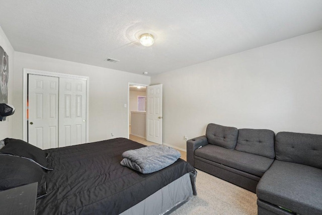 4013 Veiled Falls Dr, Pflugerville, TX 78660 - bedroom featuring a closet, carpet, and baseboards