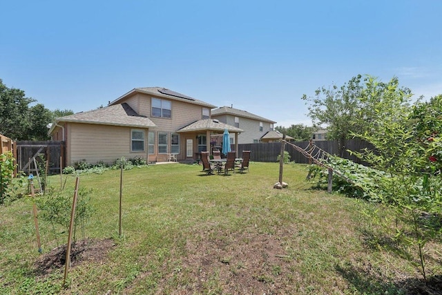 4013 Veiled Falls Dr, Pflugerville, TX 78660 - rear view of house featuring solar panels