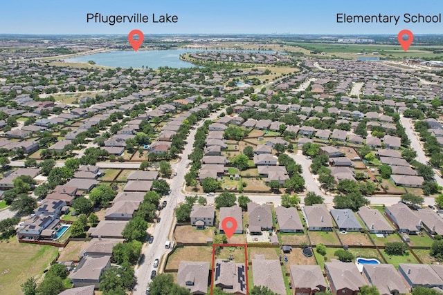 4013 Veiled Falls Dr, Pflugerville, TX 78660 - aerial view of residential area with a large body of water
