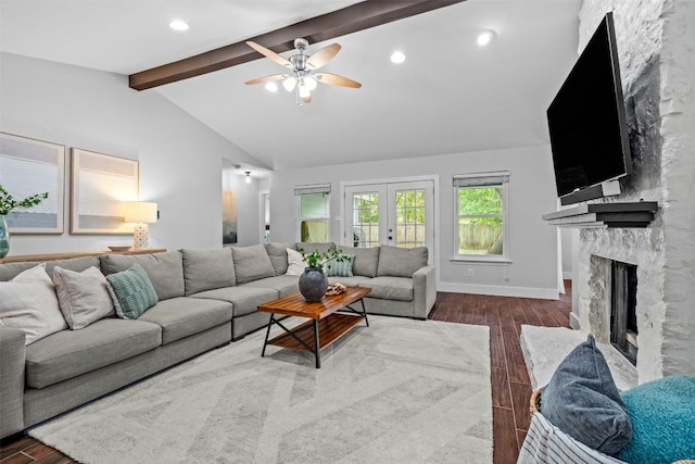 12420 Cassady Dr, Austin, TX 78727 - living room featuring a high end fireplace, dark wood-type flooring, a ceiling fan, baseboards, and recessed lighting