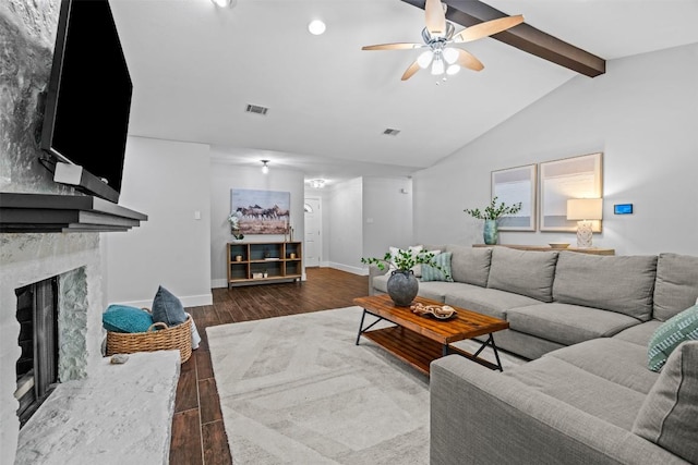 12420 Cassady Dr, Austin, TX 78727 - living area featuring ceiling fan, wood finished floors, a fireplace, and baseboards