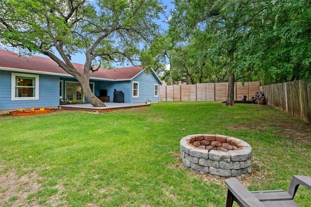 12420 Cassady Dr, Austin, TX 78727 - view of yard featuring a fire pit
