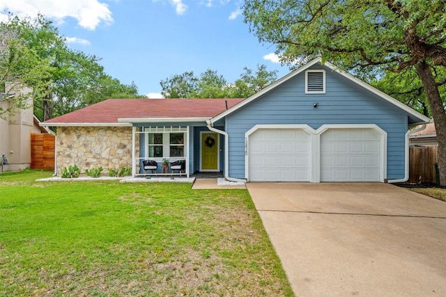 12420 Cassady Dr, Austin, TX 78727 - view of front of property with an attached garage, driveway, a porch, and stone siding