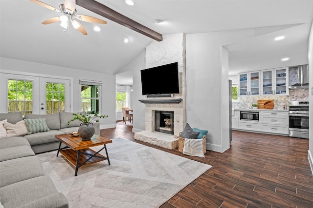 12420 Cassady Dr, Austin, TX 78727 - living room with a fireplace, ceiling fan, baseboards, recessed lighting, and dark wood-style flooring