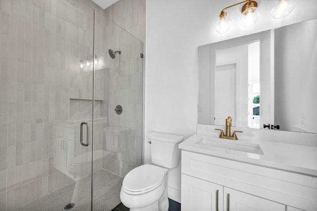 1302 Falcon Cv, Austin, TX 78745 - bathroom featuring toilet, vanity, and a stall shower