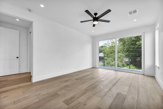 1302 Falcon Cv, Austin, TX 78745 - empty room featuring a ceiling fan, light wood finished floors, recessed lighting, baseboards, and a smoke detector