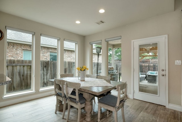 550 Cortona Ln, Georgetown, TX 78628 - dining area featuring light wood finished floors, healthy amount of natural light, recessed lighting, and baseboards