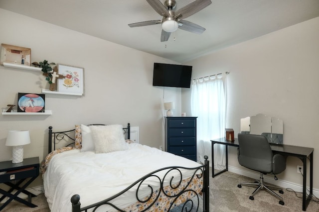 550 Cortona Ln, Georgetown, TX 78628 - carpeted bedroom with baseboards, a desk, lofted ceiling, and ceiling fan