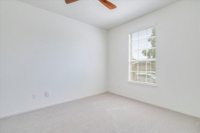 186 Sundown Ave, Buda, TX 78610 - unfurnished room with a ceiling fan, light colored carpet, and baseboards