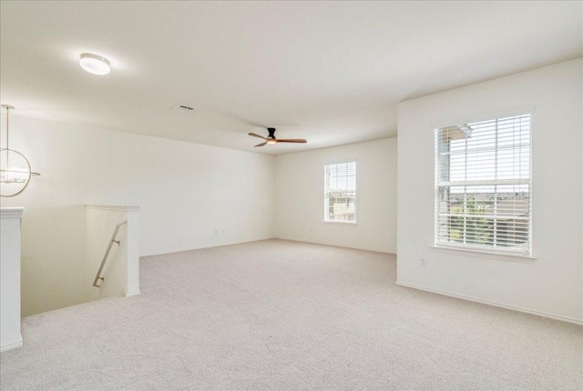 186 Sundown Ave, Buda, TX 78610 - spare room featuring light carpet and ceiling fan