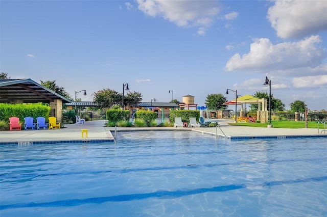 186 Sundown Ave, Buda, TX 78610 - community pool with a patio