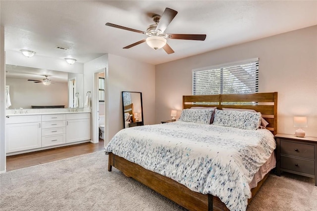 9214 Independence Loop, Austin, TX 78748 - bedroom with carpet flooring, ceiling fan, and ensuite bath
