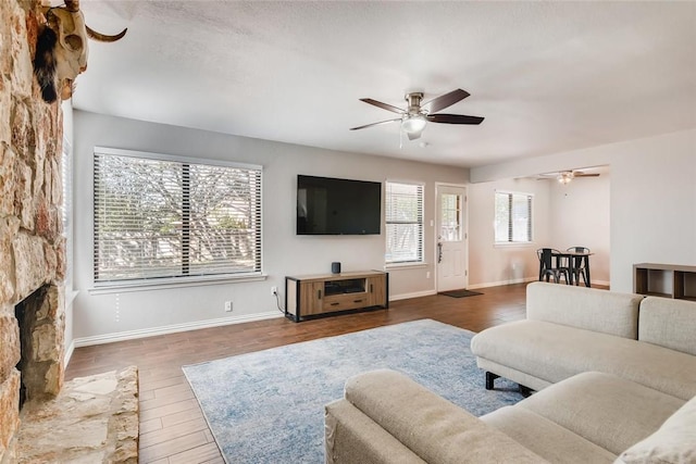 9214 Independence Loop, Austin, TX 78748 - living room featuring a ceiling fan and wood finished floors
