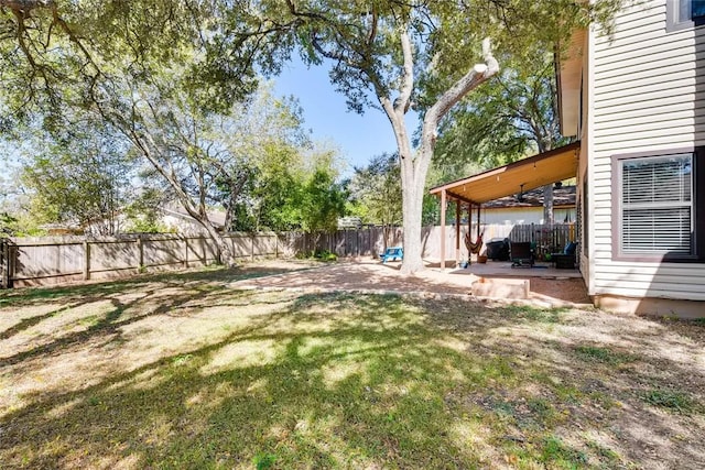 9214 Independence Loop, Austin, TX 78748 - fenced backyard featuring a patio