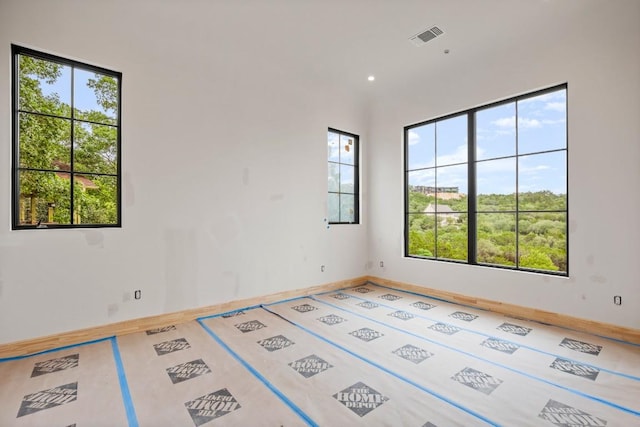 2715 Trail Of The Madrones, Austin, TX 78746 - spare room featuring baseboards
