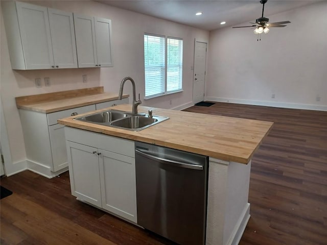 23393 Nameless Rd Unit 164, Leander, TX 78641 - kitchen featuring stainless steel dishwasher, a sink, wooden counters, dark wood-type flooring, and a center island with sink