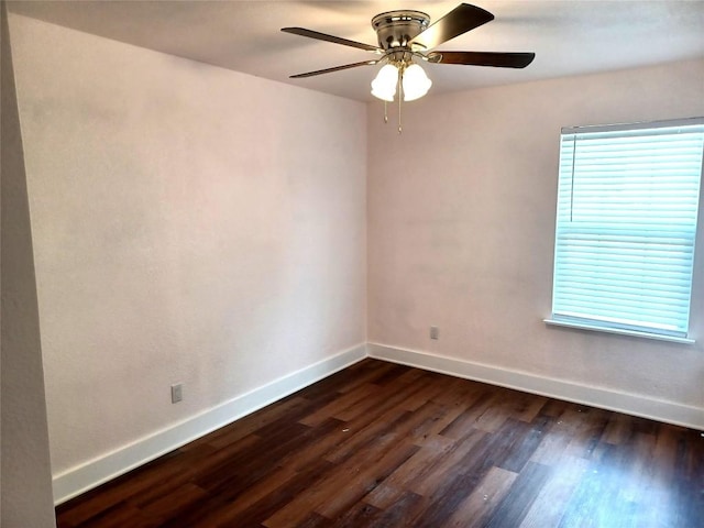 23393 Nameless Rd Unit 164, Leander, TX 78641 - spare room featuring baseboards, dark wood-style flooring, and ceiling fan