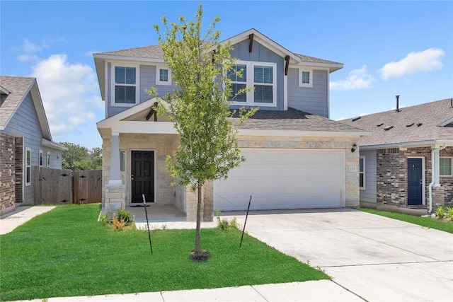 113 Bent Creek Ln, Georgetown, TX 78628 - view of front of house featuring driveway, a garage, stone siding, board and batten siding, and a shingled roof