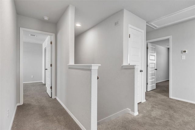 113 Bent Creek Ln, Georgetown, TX 78628 - hall with an upstairs landing, carpet flooring, attic access, and recessed lighting