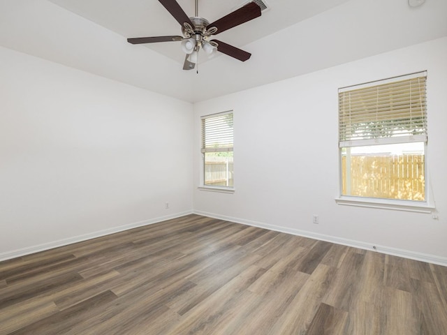8425 Shallot Way, Austin, TX 78748 - empty room with a ceiling fan, baseboards, and wood finished floors