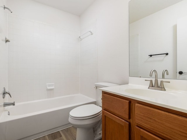 8425 Shallot Way, Austin, TX 78748 - full bath featuring wood finished floors, toilet, vanity, and shower / bathtub combination