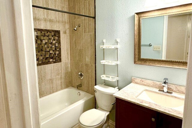 1121 Peggotty Pl, Austin, TX 78753 - full bath with vanity, shower / tub combination, and a textured wall