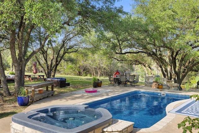 4414 Three Creek Trl, Spicewood, TX 78669 - view of pool with a patio area and a pool with connected hot tub