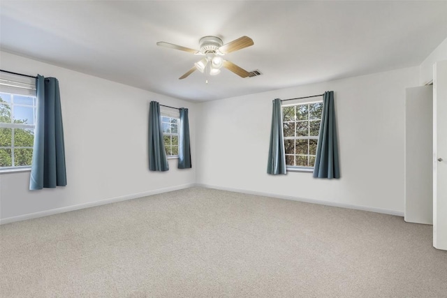 4414 Three Creek Trl, Spicewood, TX 78669 - spare room featuring carpet flooring, ceiling fan, and baseboards