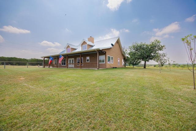 192 Indian Oaks Pass, Blanco, TX 78606 - view of home's exterior featuring a chimney and a metal roof