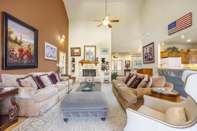 192 Indian Oaks Pass, Blanco, TX 78606 - living area featuring a high ceiling, ceiling fan, and a fireplace