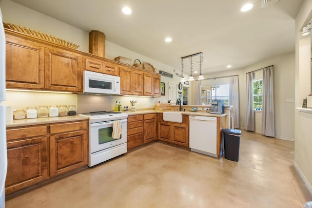 192 Indian Oaks Pass, Blanco, TX 78606 - kitchen featuring white appliances, recessed lighting, brown cabinets, and light countertops