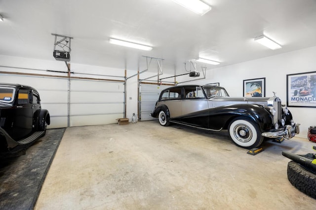 192 Indian Oaks Pass, Blanco, TX 78606 - garage featuring a garage door opener