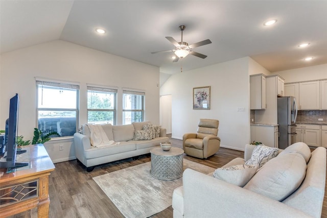 2212 Mcclendon Trl, Leander, TX 78641 - living room featuring ceiling fan, wood finished floors, recessed lighting, vaulted ceiling, and baseboards