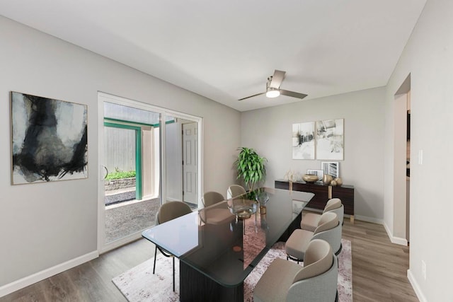 6718 Silvermine Dr Unit 804, Austin, TX 78736 - dining room featuring wood finished floors, baseboards, and ceiling fan