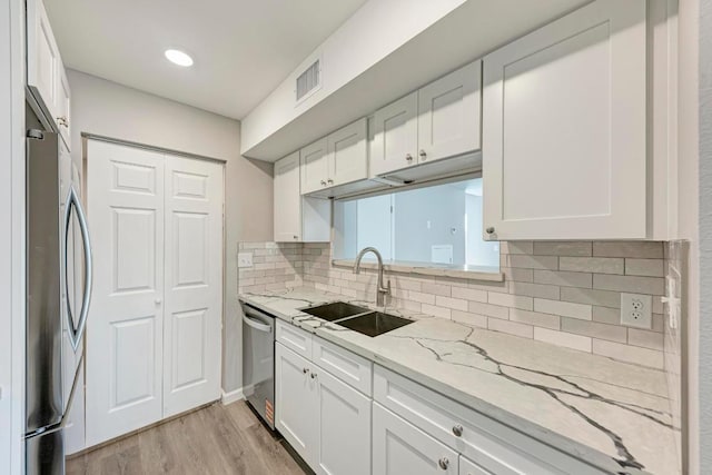 6718 Silvermine Dr Unit 804, Austin, TX 78736 - kitchen with a sink, appliances with stainless steel finishes, and white cabinets