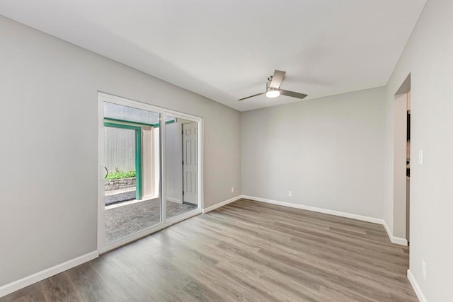 6718 Silvermine Dr Unit 804, Austin, TX 78736 - unfurnished room featuring wood finished floors, a ceiling fan, and baseboards