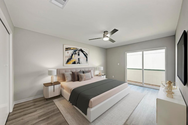 6718 Silvermine Dr Unit 804, Austin, TX 78736 - bedroom featuring wood finished floors, access to outside, ceiling fan, and baseboards