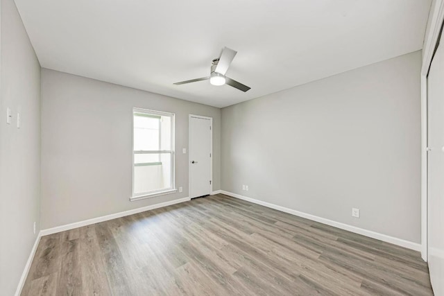 6718 Silvermine Dr Unit 804, Austin, TX 78736 - unfurnished room featuring wood finished floors, baseboards, and ceiling fan
