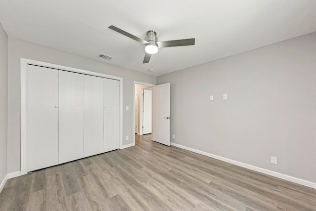 6718 Silvermine Dr Unit 804, Austin, TX 78736 - unfurnished bedroom featuring wood finished floors, baseboards, a closet, and ceiling fan