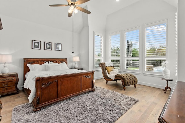 116 Egret Ln, Austin, TX 78737 - bedroom featuring light wood-style flooring, a ceiling fan, baseboards, and high vaulted ceiling
