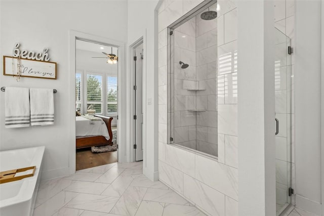 116 Egret Ln, Austin, TX 78737 - ensuite bathroom with a shower stall, marble finish flooring, a ceiling fan, and baseboards
